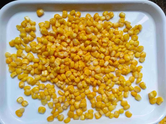 Pronto da mangiare, in scatola, mais dolce, consistenza morbida, origine varia, comunemente USA, adatto all'imballaggio e alla lavorazione degli alimenti