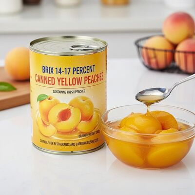 Brix 14-17% di pesca gialla in scatola contenente pesche fresche, peso sgocciolato 240 g, adatta per ristoranti e attività di catering